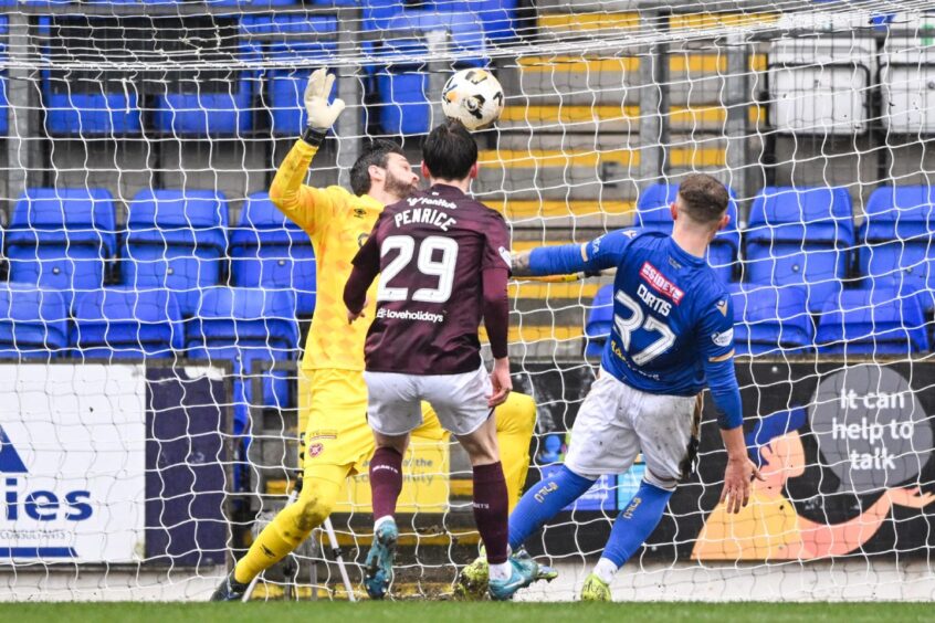 Craig Gordon makes a magnificent save to deny Sam Curtis.