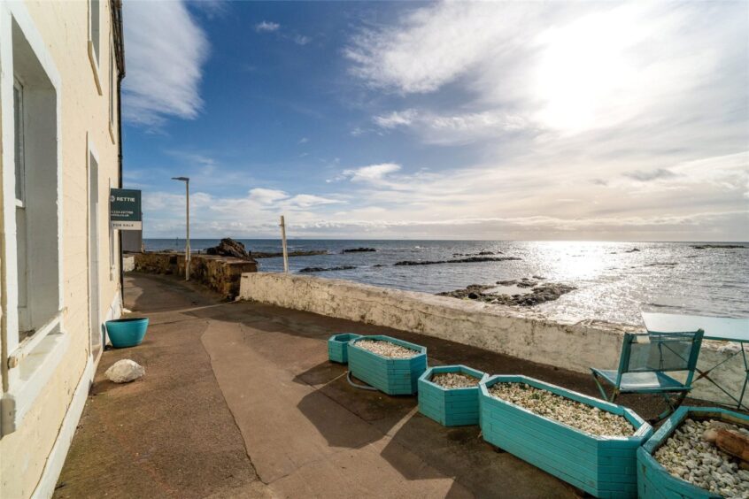 There is beach access from the sea wall.