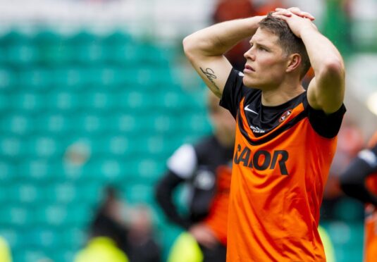 John Rankin's dejection at full-time of the 2014 final was clear. Image: SNS