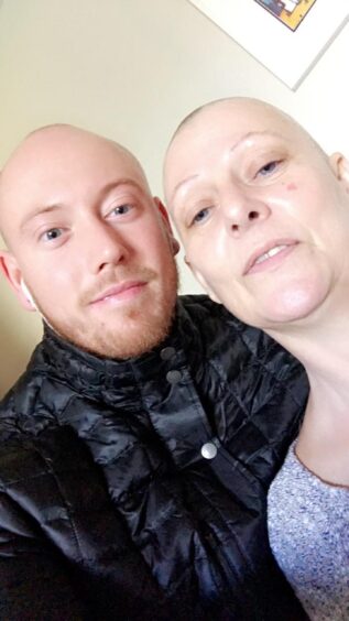 Kirkcaldy fireman Brian with his mum who has fought womb cancer.