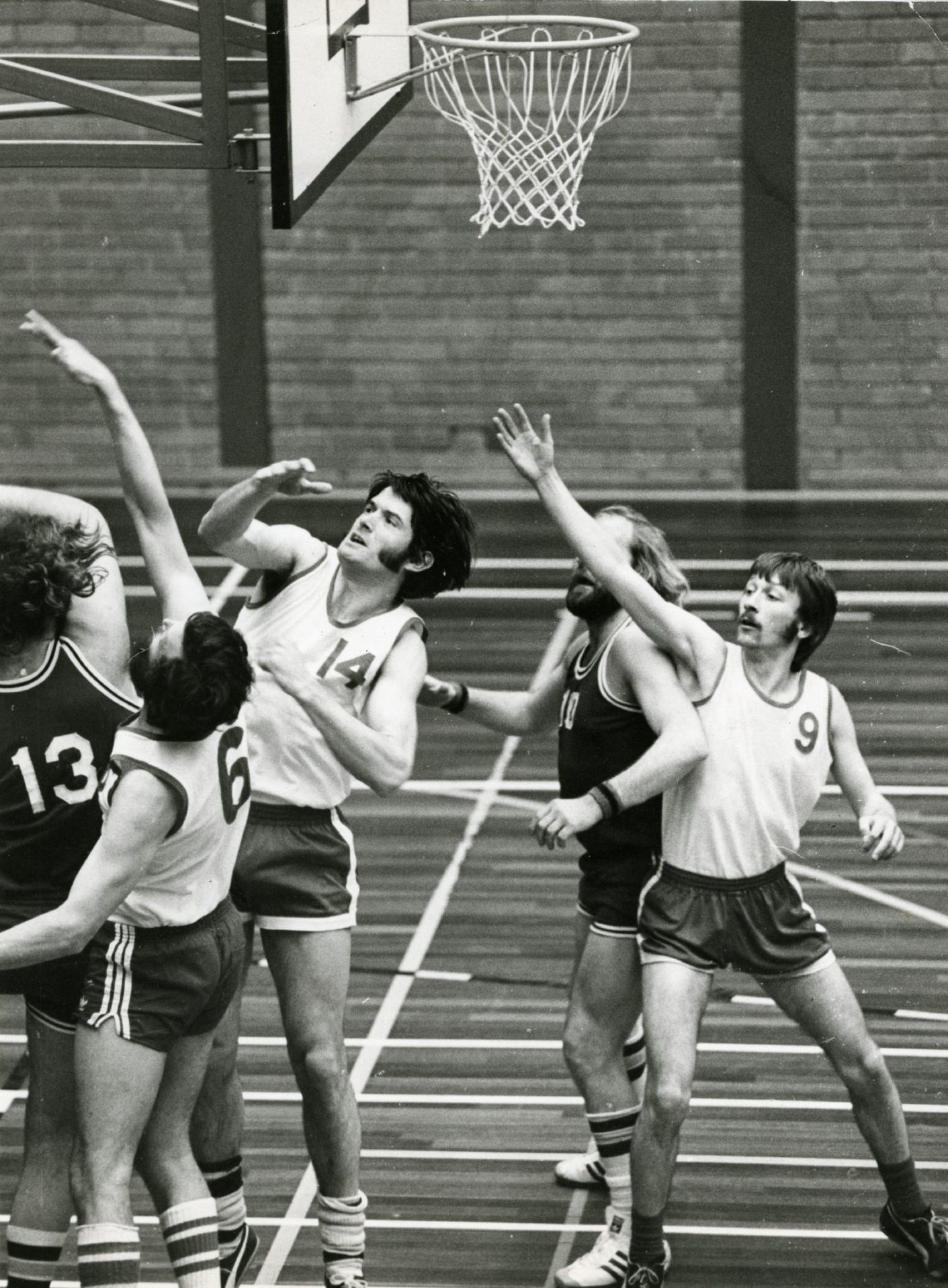 players jockey for position under the hoop as Ardler Bullets and Brechin Basketball Club play in 1978. 