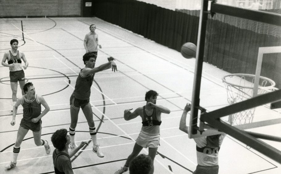 a player shoots in an action shot from a game involving the Menzieshill Princes. 