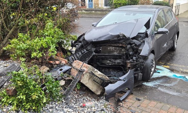 Car in wall at Victoria Hotel, Kirkcaldy