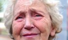 elderly woman crying. but those who need adult support and protection in Fife can get help