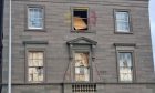 Smashed windows at Custom House in Dundee.