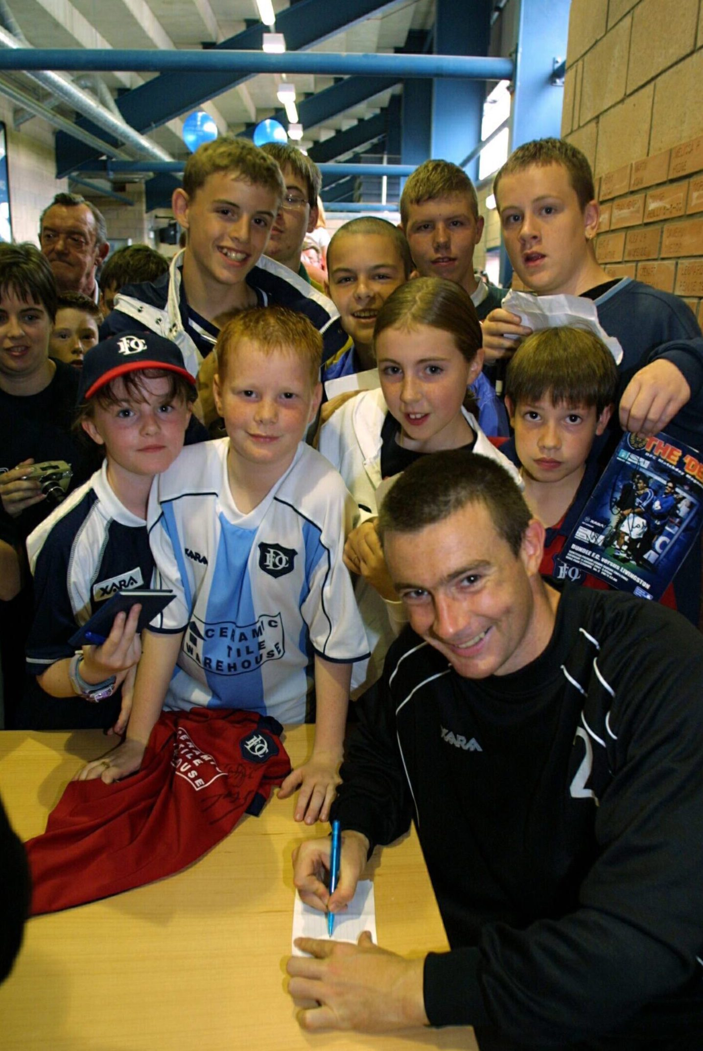 Dundee player Barry Smith meets the fans.