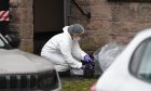 Forensics officers at flats in Stormont Street Perth