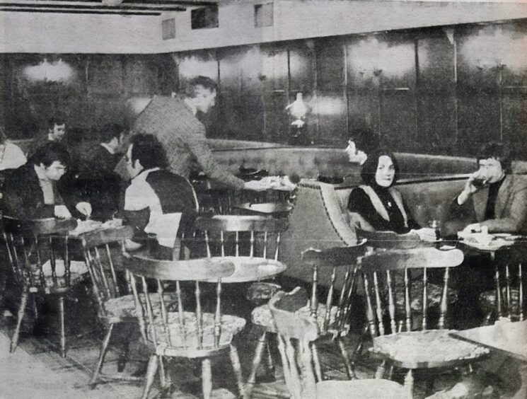 people sitting in the pub's dining area