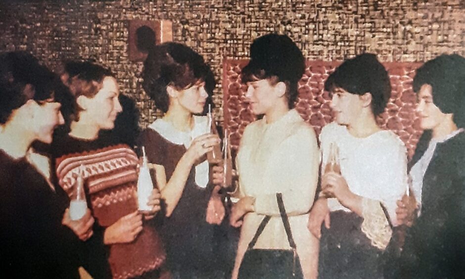 a group of girls enjoying a soft drink at the Haparanda in the 1960s. 