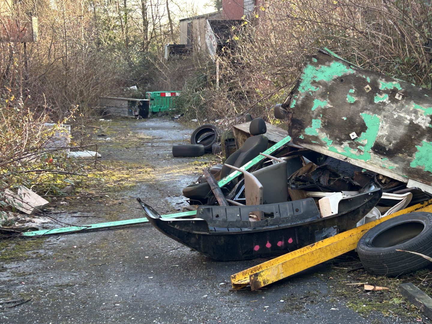 Abandoned car parts dumped at the estate.