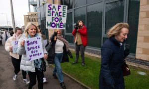 Family and supporters demonstrating outside Sandie Peggie's employment tribunal. Image: Alan Richardson.