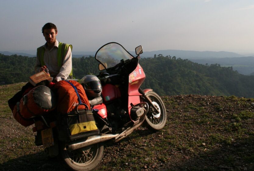 Gavin on his motorbike in the foothills of the Himalayas in India during his travels in 2007.