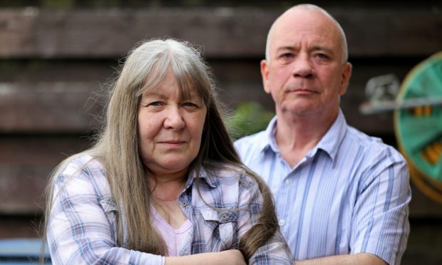 Evening telegraph/ Courier  Dundee news CR0035433   G Jennings pics , Paul & Irene Caswell ,Kingsway West,Dundee, talking about their son Ryan being in Carsview, wednesday 11th May.