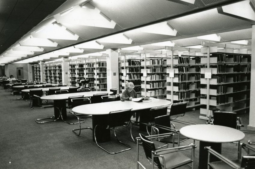 tables and book shelves inside Dundee University's new library