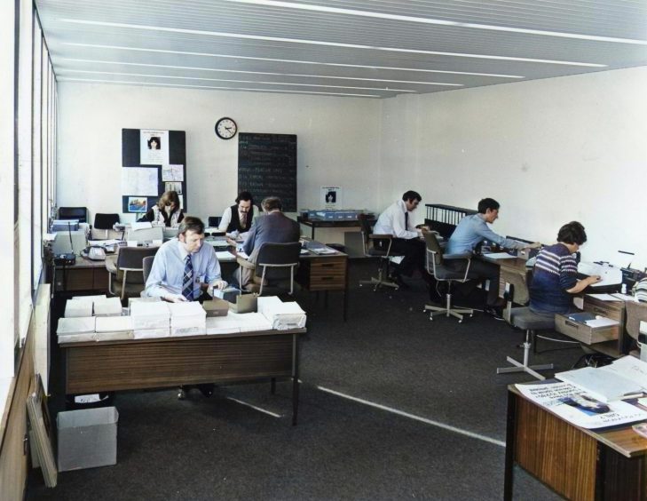 people working at desks in the Dundee Police incident room in March 1980. 