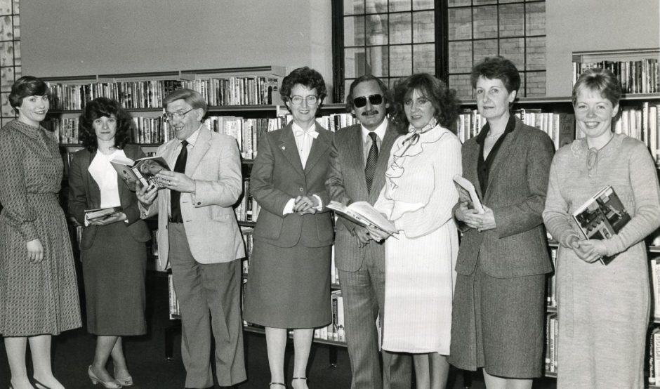 librarians and councillors viewing the refurbished lending library