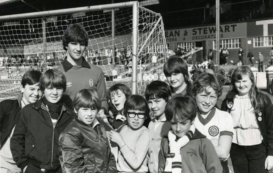 Dundee FC goalkeeper Bobby Geddes signing autographs in 1982.