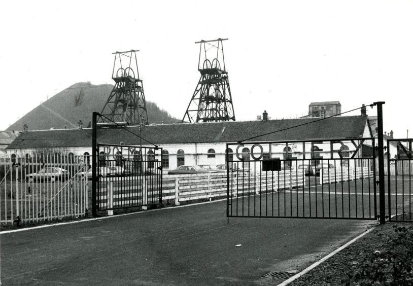 The main gates at Polmaise Colliery in February 1985, with the winding gear visible in the background