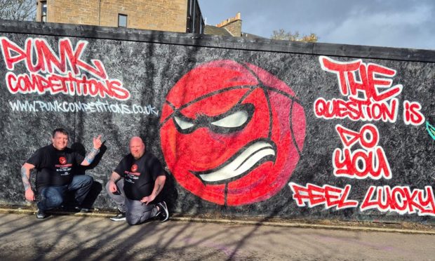 Alan Soutar and Steven Ferrie at the graffiti promoting their new venture at Seabraes