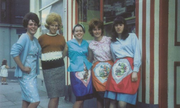 five girls stand outside The Haparanda Coffee Bar in Dundee