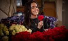 Jodi Gray surrounded by hundreds of Valentine's Day roses at her luxury florist, Bloom, on Dundee's Strathmartine Road.