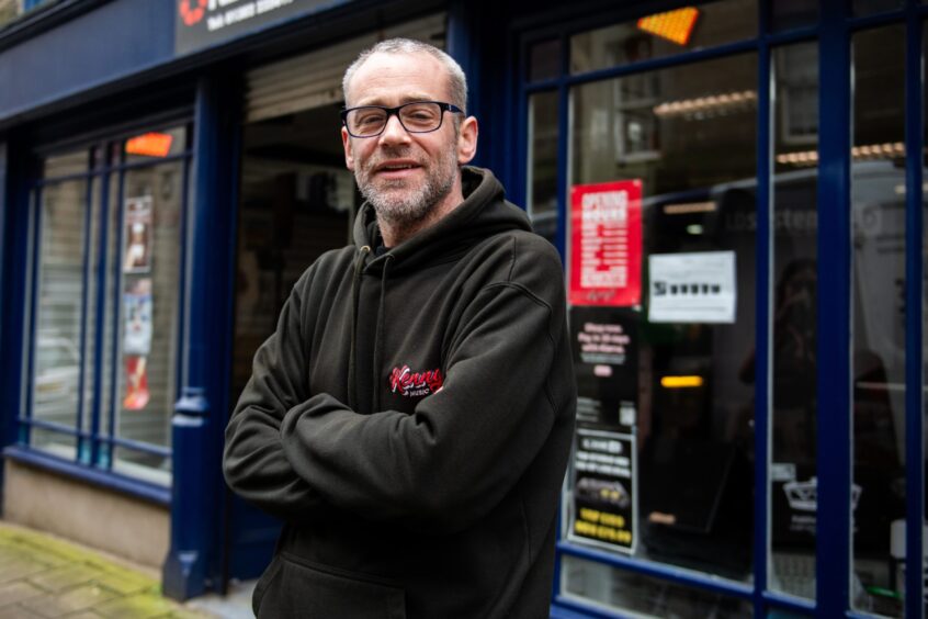 Drew Innes outside the Kenny's Music store in Dundee