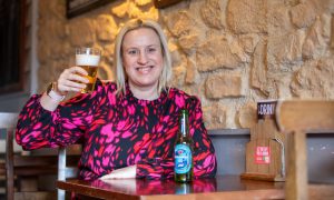 Debbie enjoys a beer in the East Port Bar in Dunfermline.