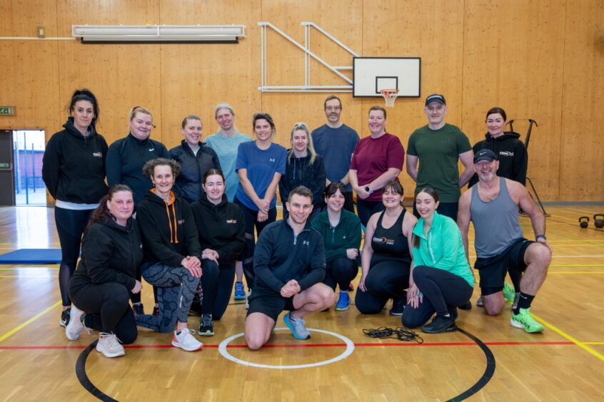 Fife fitness trainer Jamie with members of one his his classes in Kelty.