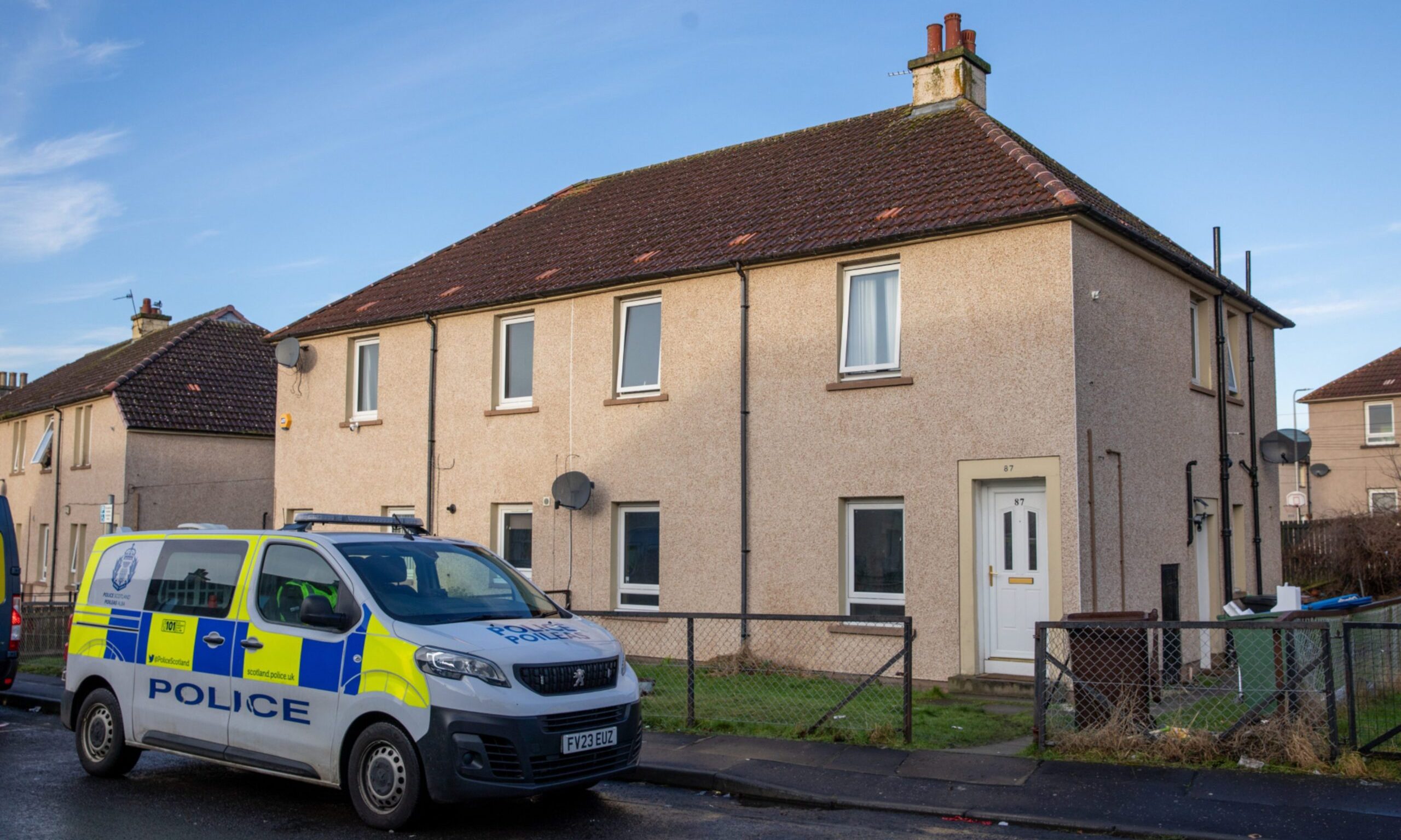 Police outside the house on East March Street, Kirkcaldy, after the fire. Image: Kenny Smith/DC Thomson