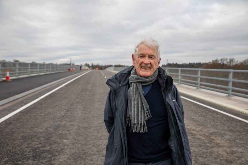 Gordon hay smiling in anorak and scarf on Destiny Bridge