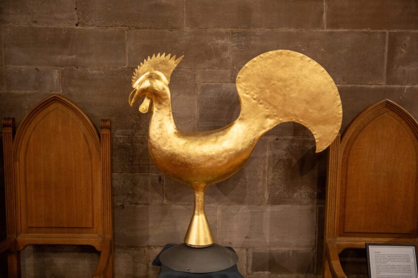 Golden metal bird from weathervane