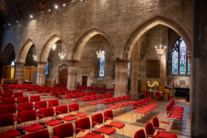 St John's Kirk interior with rows of chairs laid out