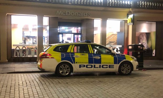 Police outside the Reform Street McDonald's in Dundee.