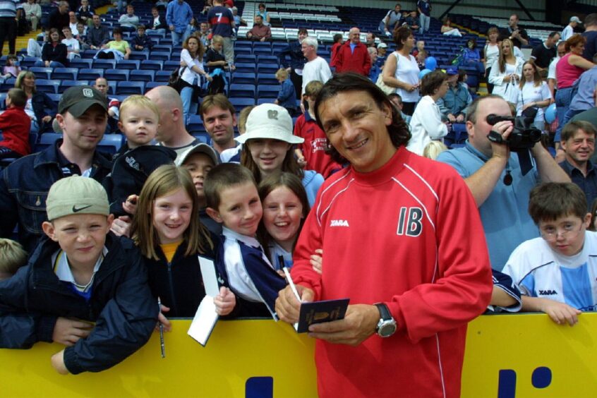Ivano Bonetti signing autographs for young fans at Dens Park