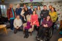 Betty Black in centre, surrounded by large family group at Louisebrae care home, Perth