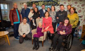 Betty Black in centre, surrounded by large family group at Louisebrae care home, Perth