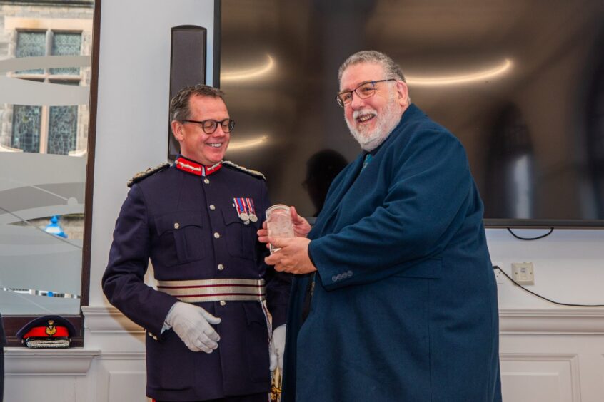 John Watson receiving award from Stephen Leckie in Lord Lieutenant regalia