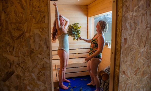 Katrino of Yogi Oils and Rachel McConachie in the sauna using the oak sauna whisks. Image: Steve MacDougall/DC Thomson