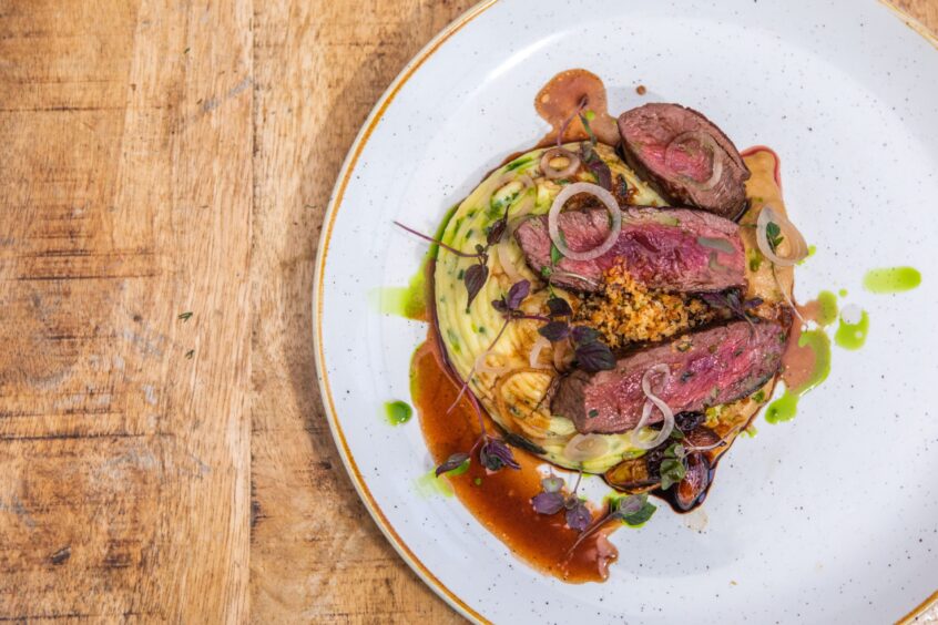 Scottish Roe deer loin, chive mashed potato, caramelized onion, and shallot puree at Taypark House Hotel. Image: Steve MacDougall/DC Thomson.