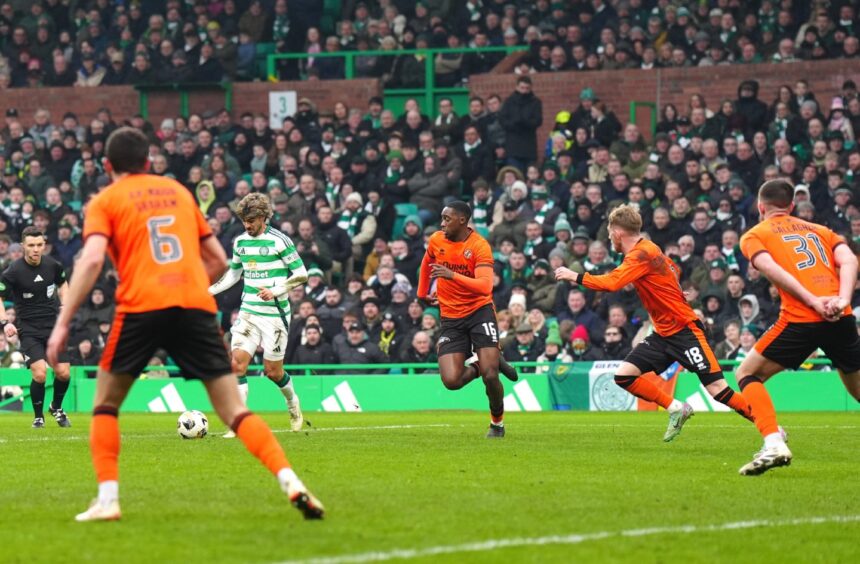 Celtic's Jota cuts inside before scoring the second goal against Dundee United