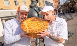 Clark's Bakery owner Jonathan Clark and baker Colin Smith share a Desperate Dan size pie with the great man himself. Image: Steve Brown/DC Thomson