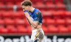 A dejected Stephen Duke-McKenna after St Johnstone's defeat to Hearts.