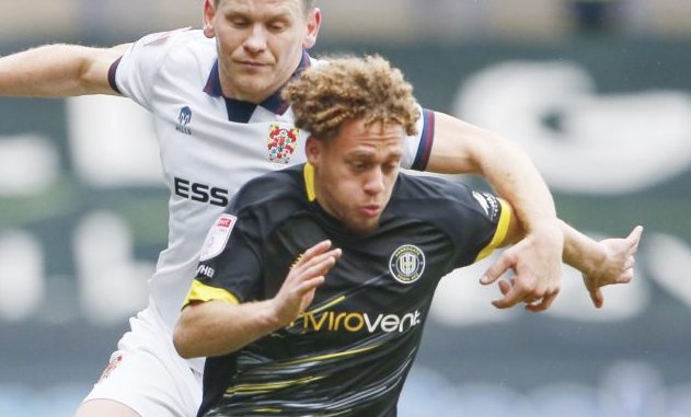 Stephen Duke-McKenna goes past a Tranmere Rovers defender.