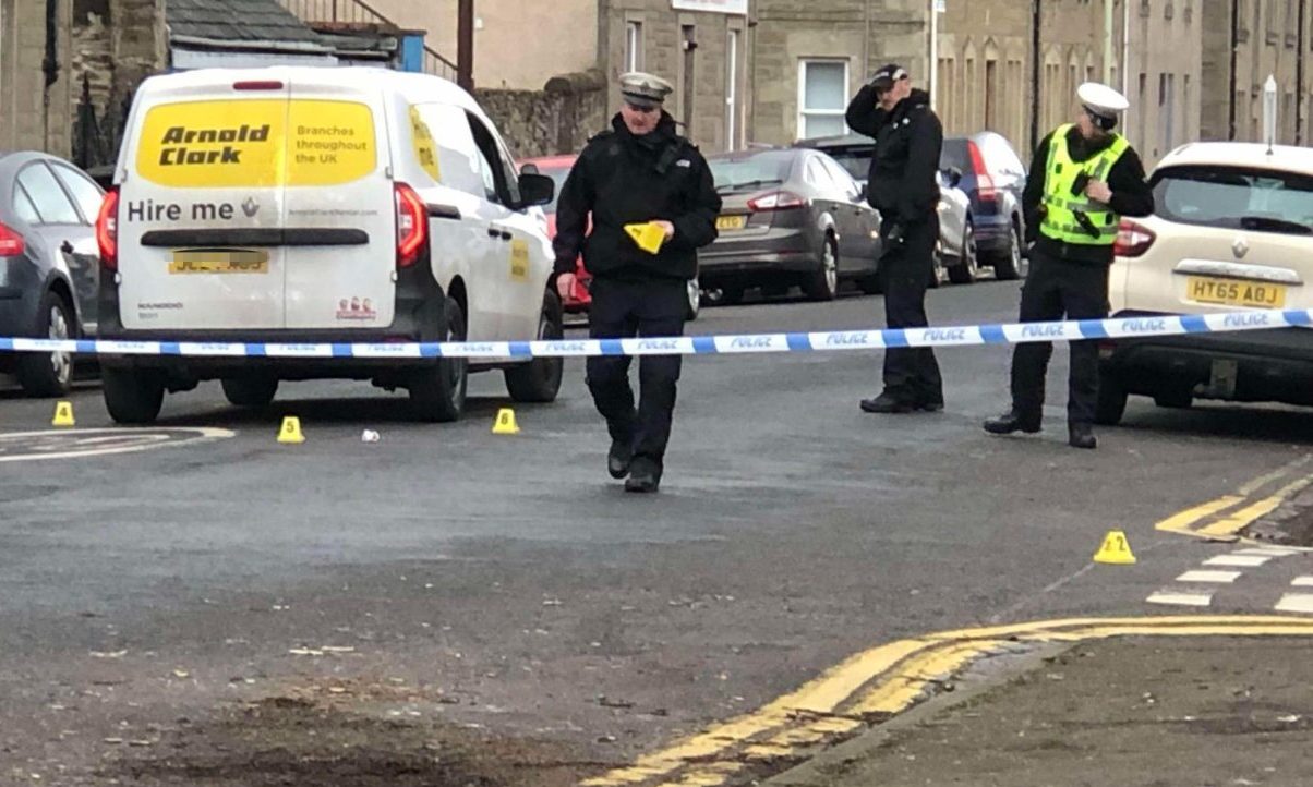 Police at the scene of the crash involving the van ad a pedestrian on Church Street, Broughty Ferry. Image: James Simpson/DC Thomson