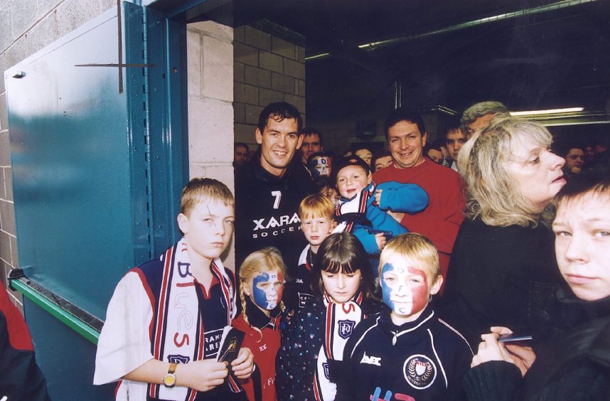 Fans with Willie Falconer in 1999