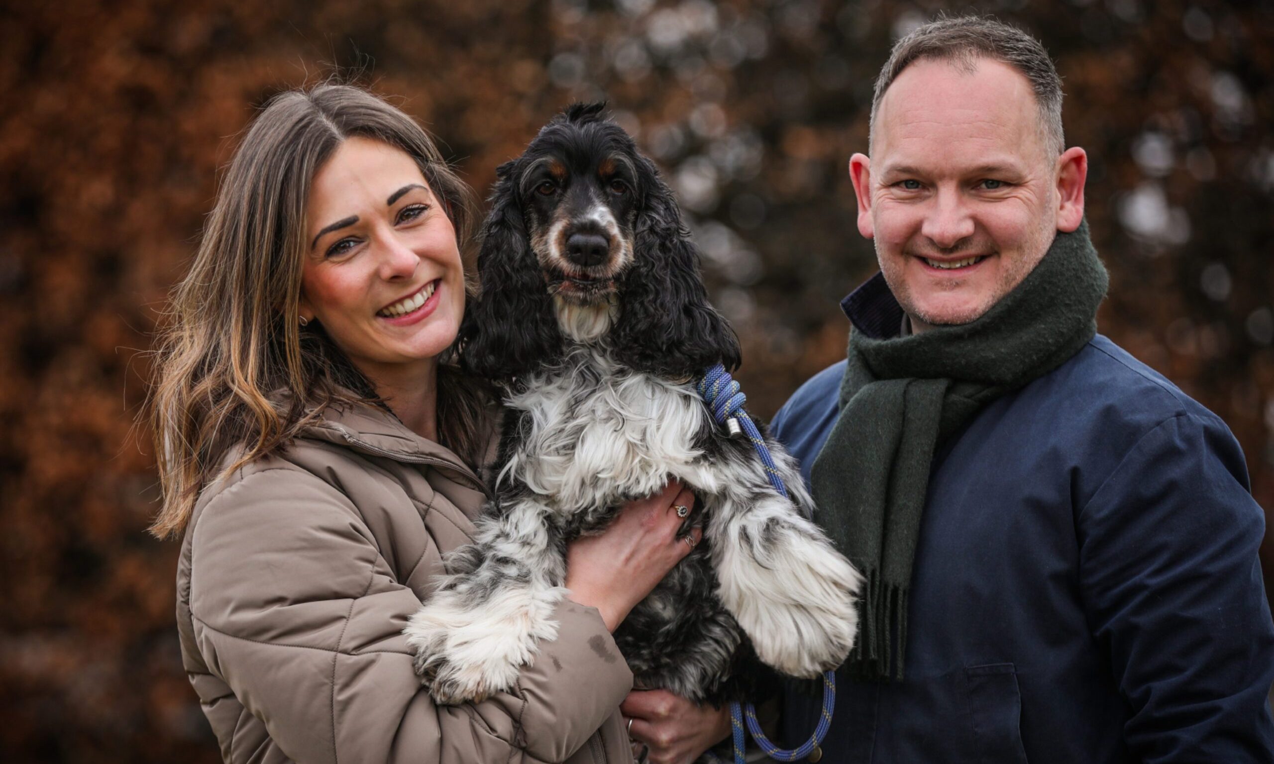 Broughty Ferry woman Kirsty Speers had nine organs removed after rare cancer diagnosis. She is pictured with her partner Neil Petrie and their cocker spaniel Archie.