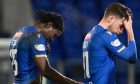 Aaron Essel and Graham Carey are dejected after St Johnstone were beaten by Dundee in January.