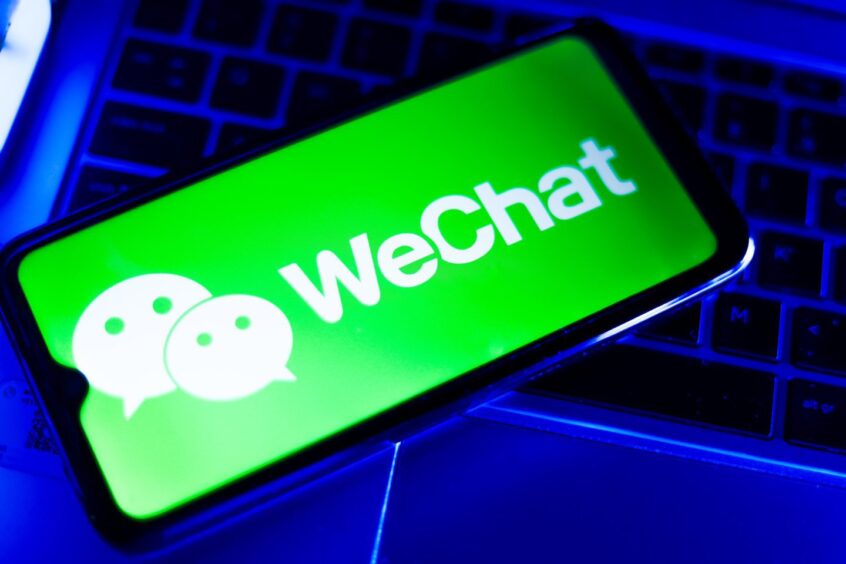 WeChat logo on mobile phone