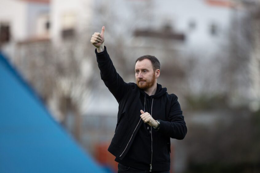 Ian Cathro passes on a message to his players