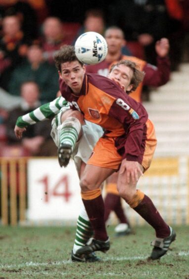 Simo Valakari gets the better of Celtic's Peter Grant in a game for Motherwell. 